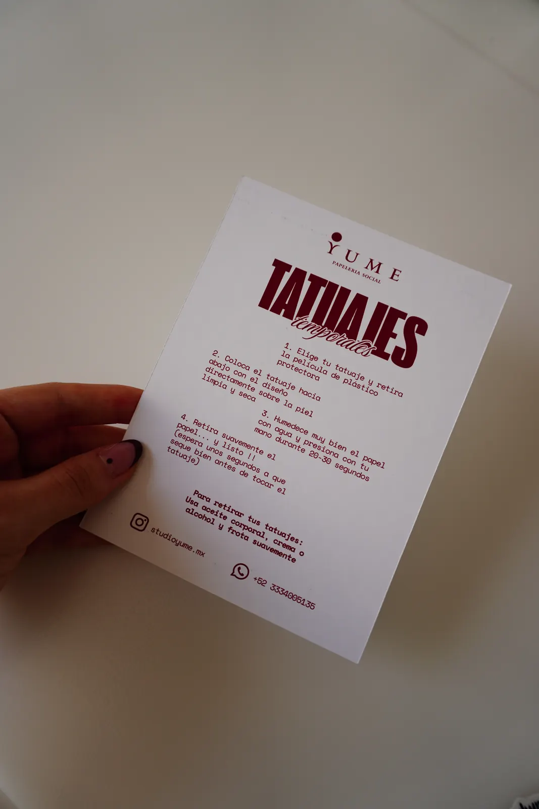 Yume card with the 4 steps to apply and remove the temporary tattoos