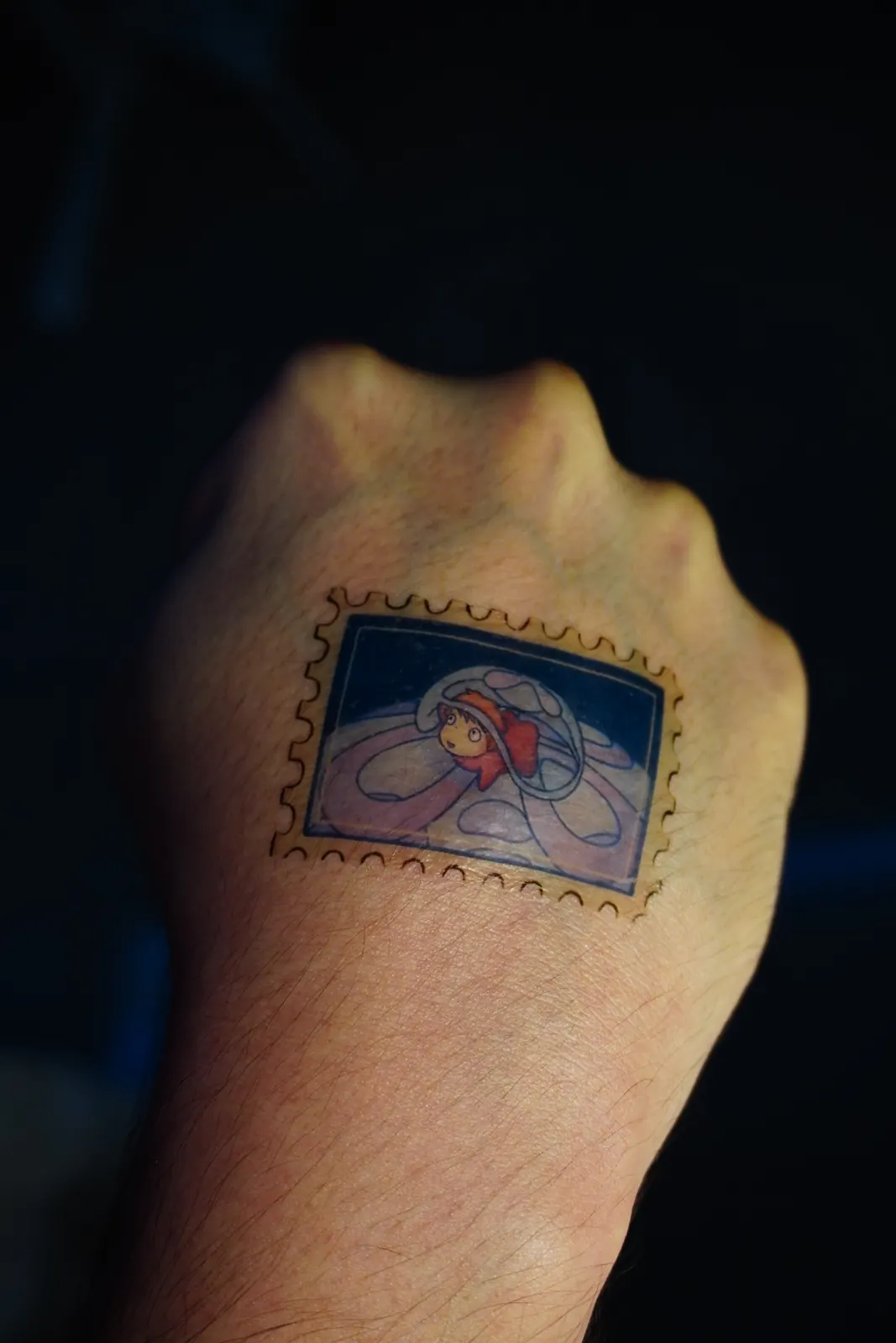 Postage-stamp temporary tattoo of Ponyo, applied on the back of the hand