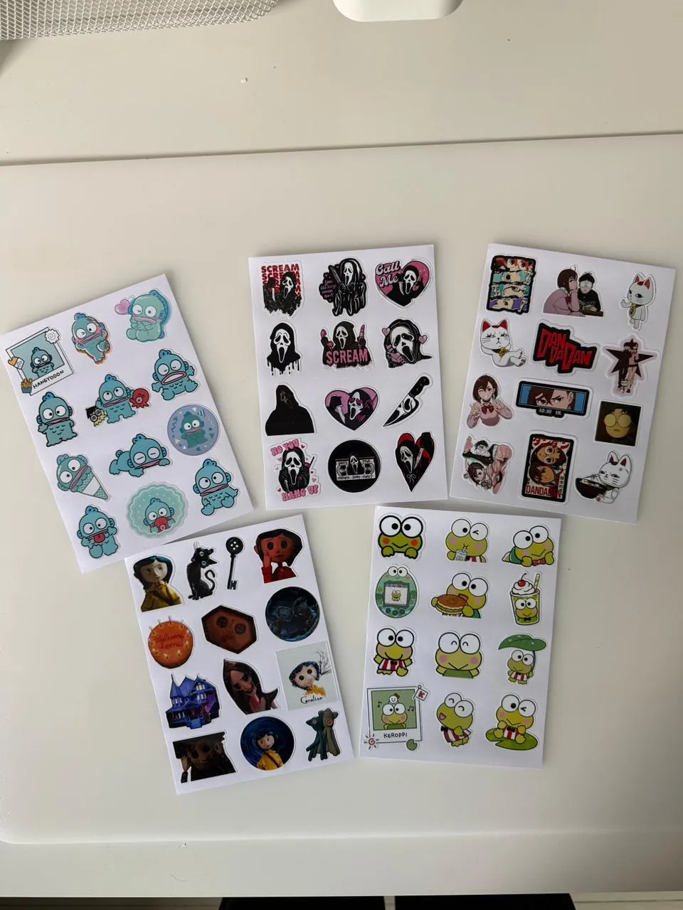 Five sticker sheets: Hangyodon, Scream, Dan Da Dan, Coraline and Keroppi