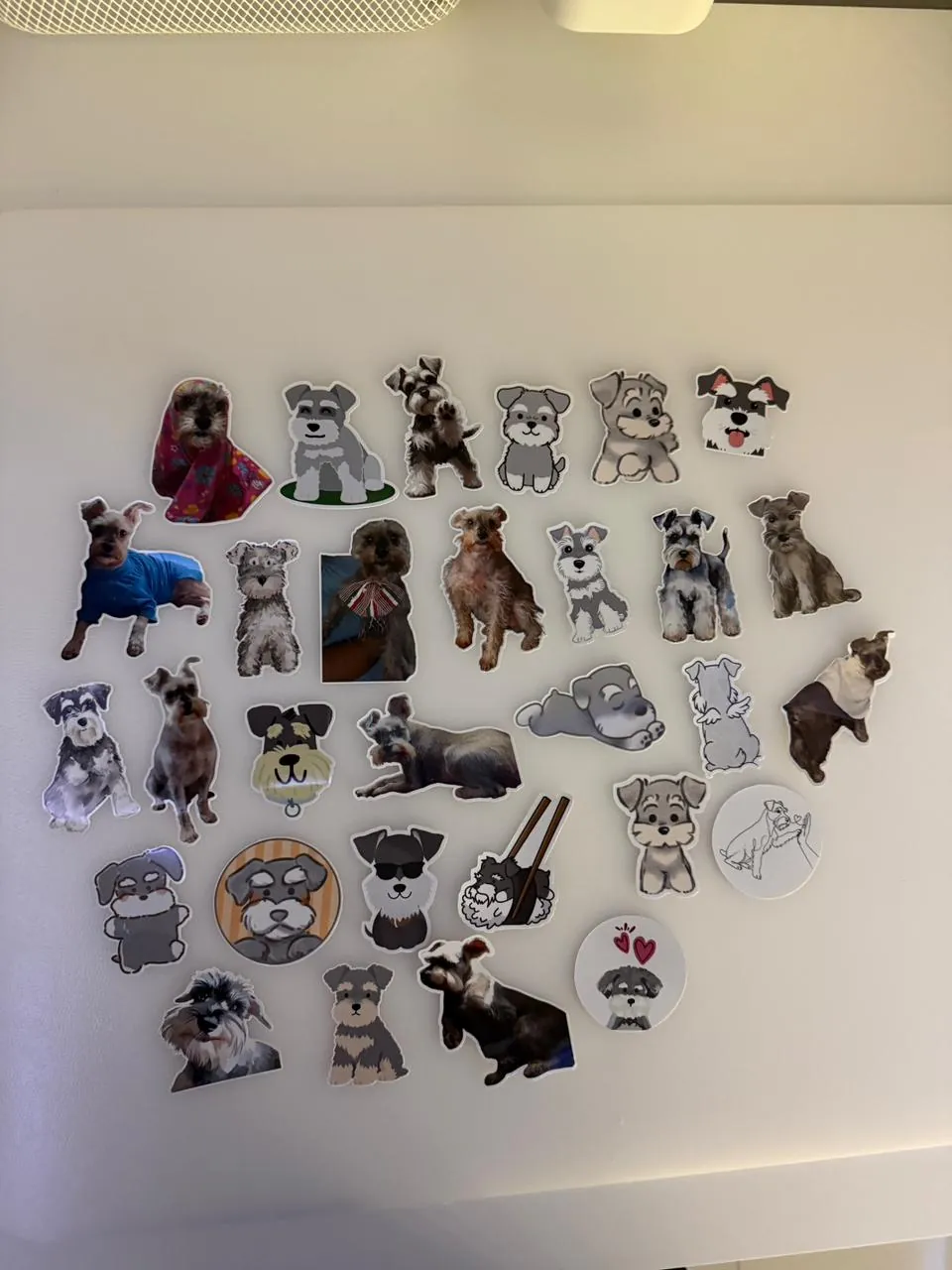Collection of illustrated and photo-based Schnauzer dog stickers